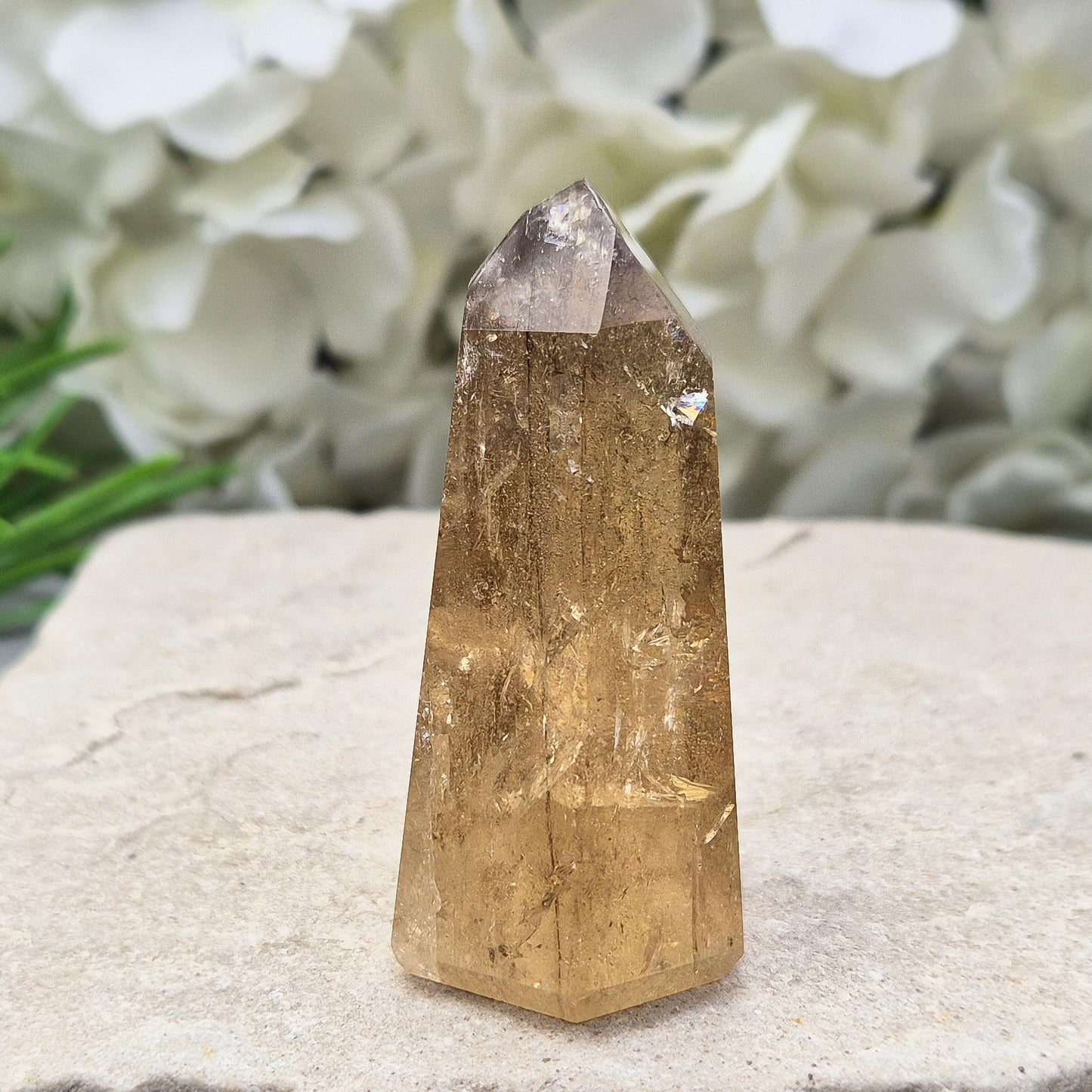natural citrine from Brazil. Ideal crystal for decorating sacred spaces or gifting to crystal enthusiasts. Polished point ideal for your home and workspace.