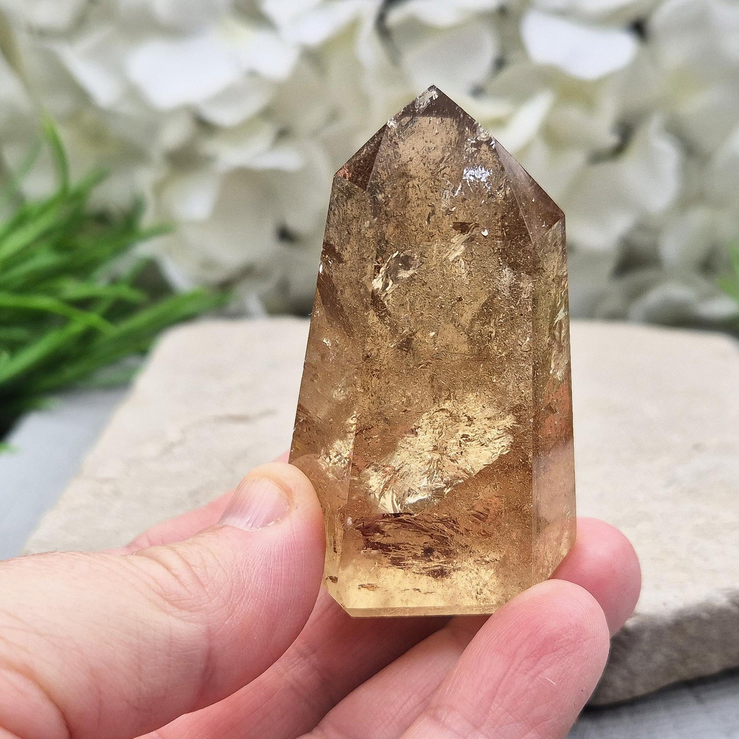 natural citrine from Brazil. Ideal crystal for decorating sacred spaces or gifting to crystal enthusiasts. Polished point ideal for your home and workspace.
