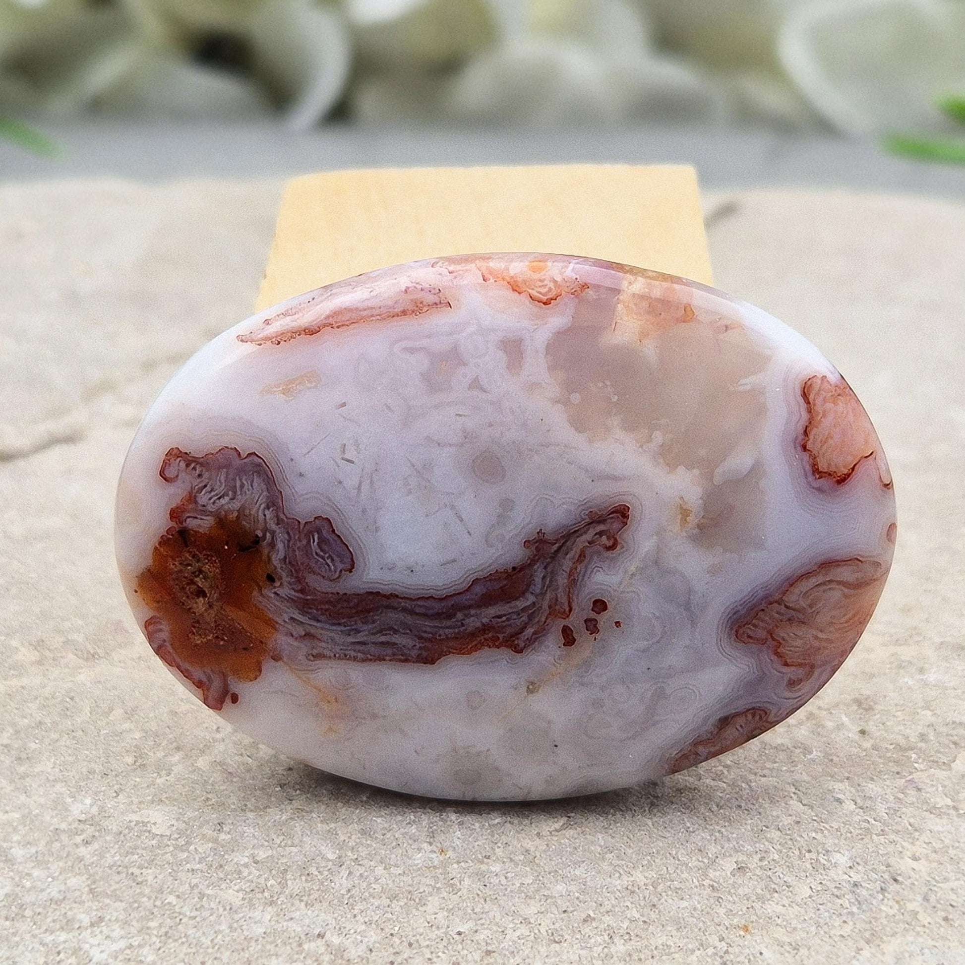 Smooth Moroccan Agate palm stone – encourages emotional balance, steadiness, and gentle confidence in everyday life. 