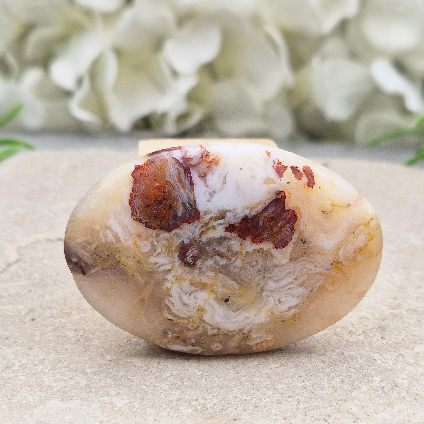 Polished Moroccan Agate palm stone – promotes grounding, resilience, and a centred, balanced feeling whenever you hold it. 