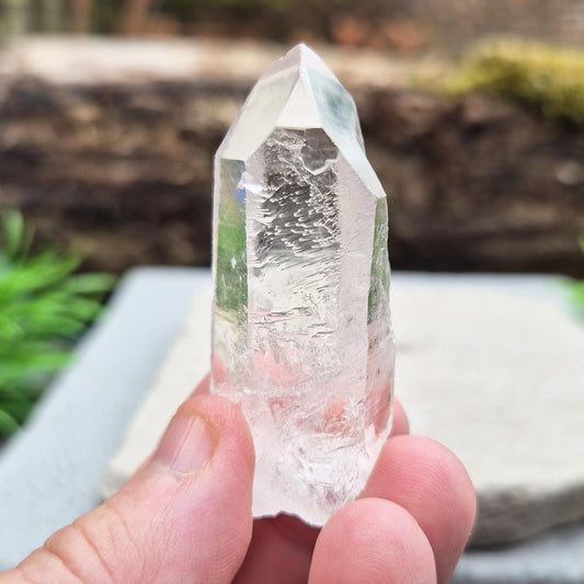 Starbrary Quartz Crystal Point from Brazil with etched markings. A unique stone for intuition, meditation, and connection to higher guidance.