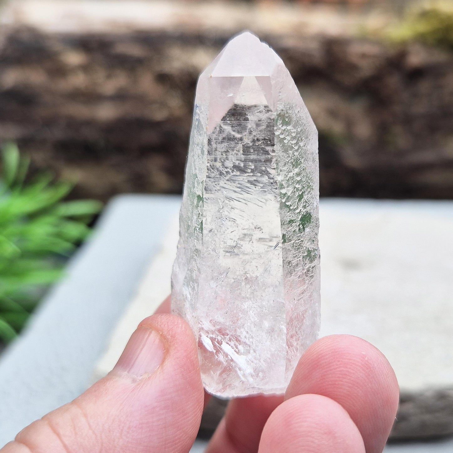 Starbrary Quartz Crystal Point from Brazil with etched markings. A unique stone for intuition, meditation, and connection to higher guidance.