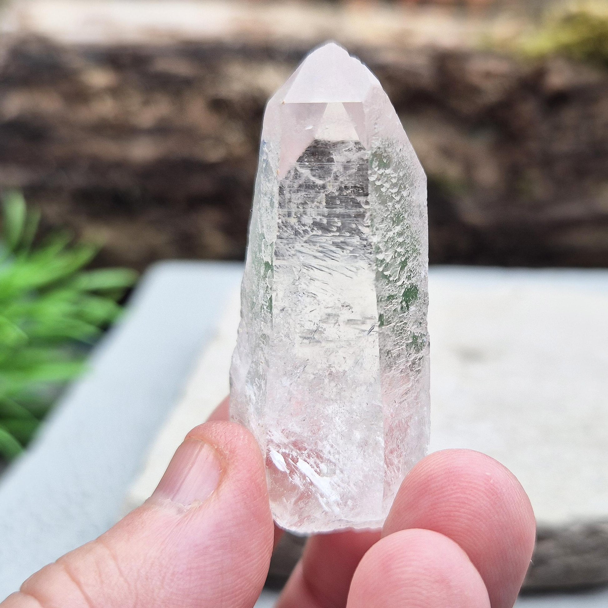 Starbrary Quartz Crystal Point from Brazil with etched markings. A unique stone for intuition, meditation, and connection to higher guidance.