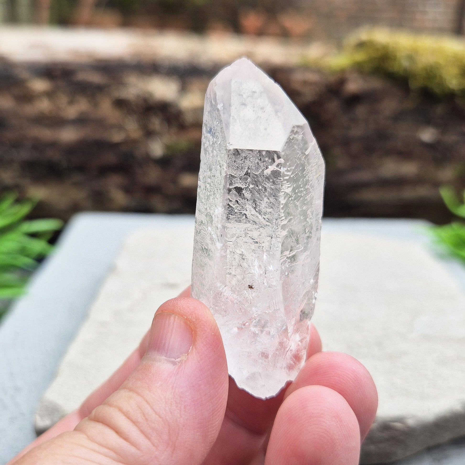 Starbrary Quartz Crystal Point from Brazil with etched markings. A unique stone for intuition, meditation, and connection to higher guidance.