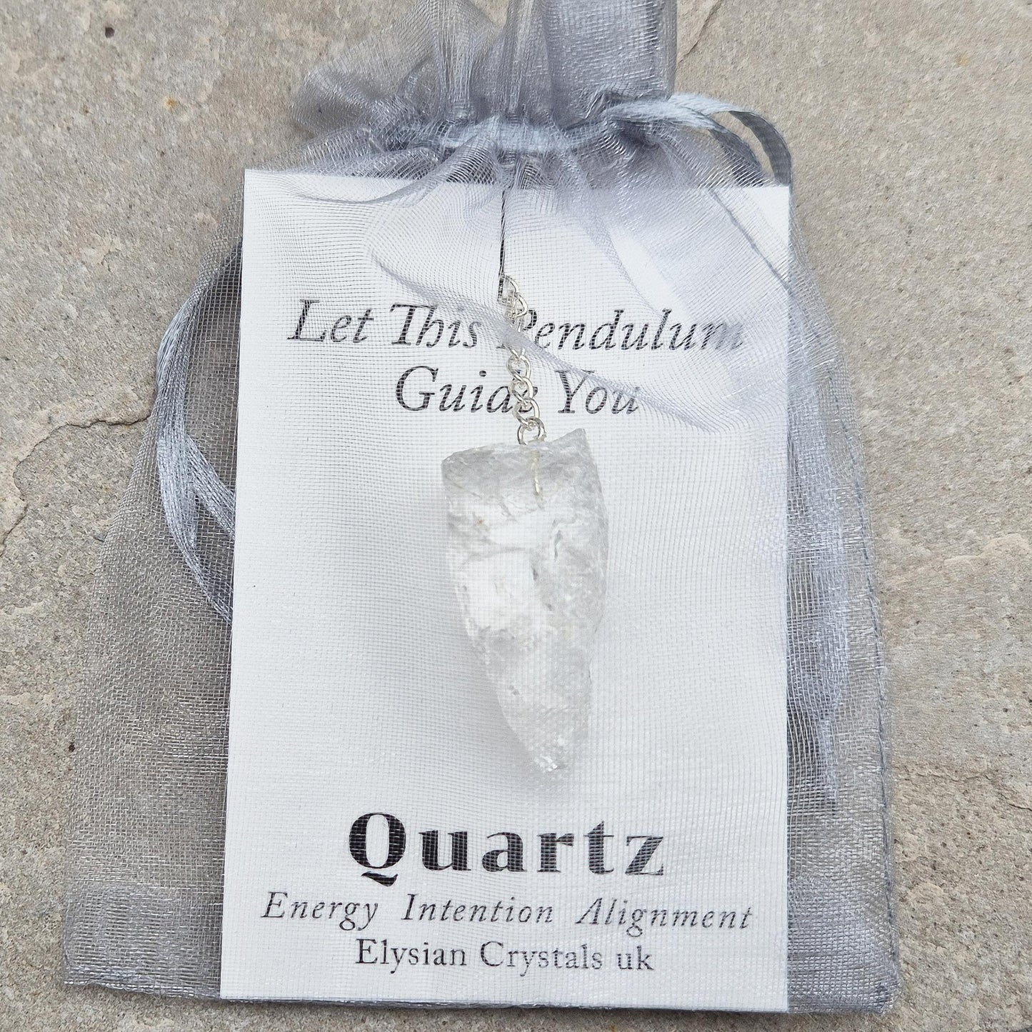 Rock Quartz crystal pendulum for dowsing, energy work, meditation, and connecting with your intuition. A beautiful tool to support focus and awareness.
