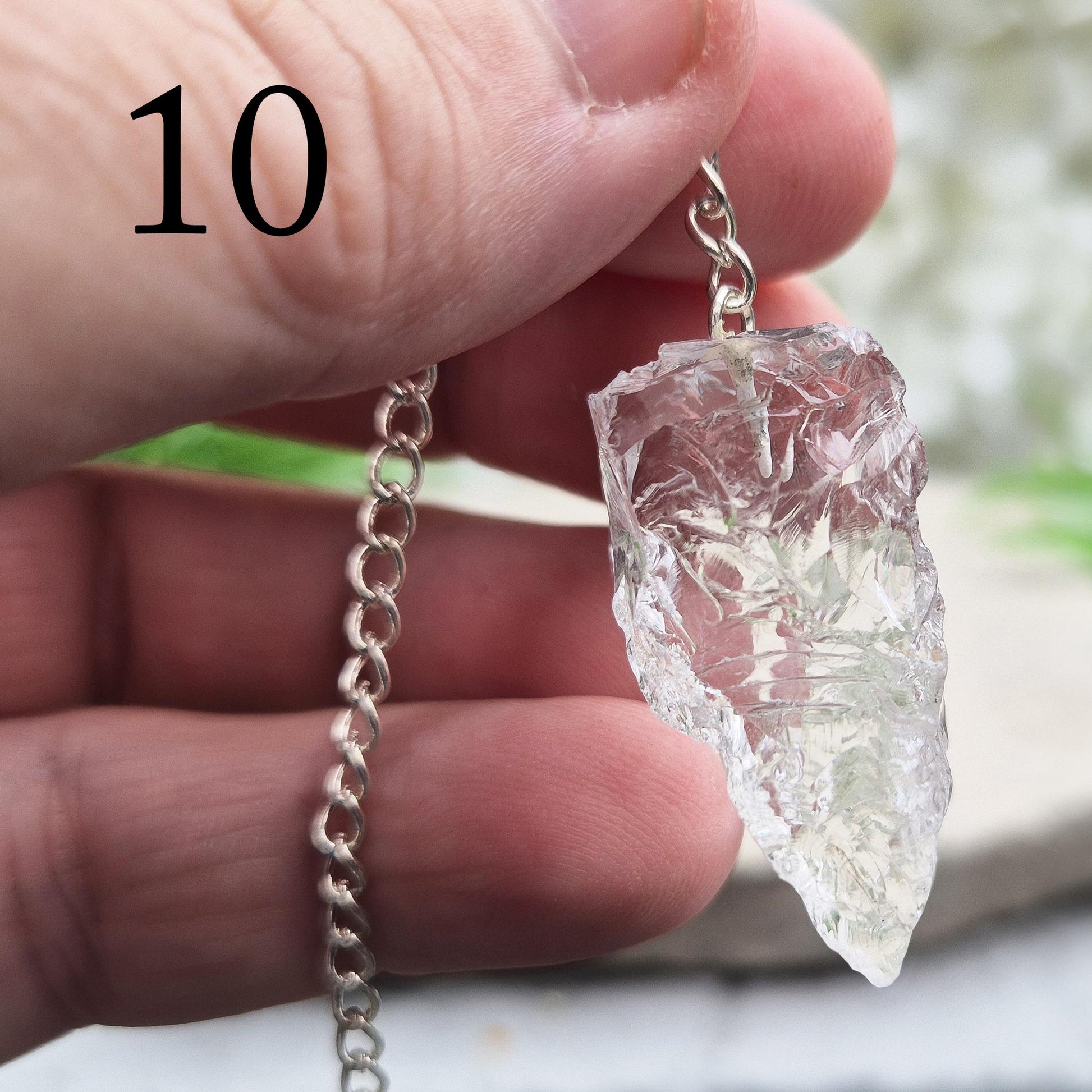 Rock Quartz crystal pendulum for dowsing, energy work, meditation, and connecting with your intuition. A beautiful tool to support focus and awareness.