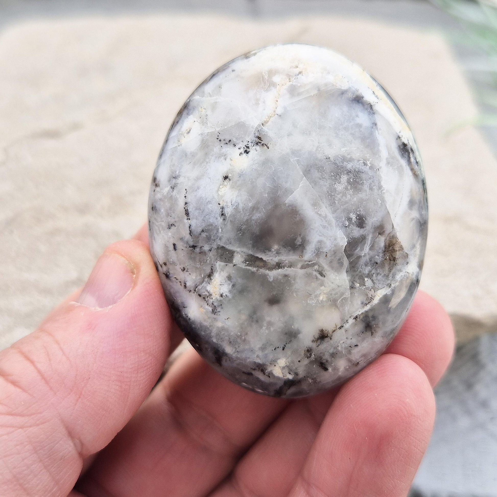 Discover the calming energy of Dendritic Opal (Merlinite) Palm Stones. Perfect for meditation, energy work, and personal growth. Cleansed and ready to use. 