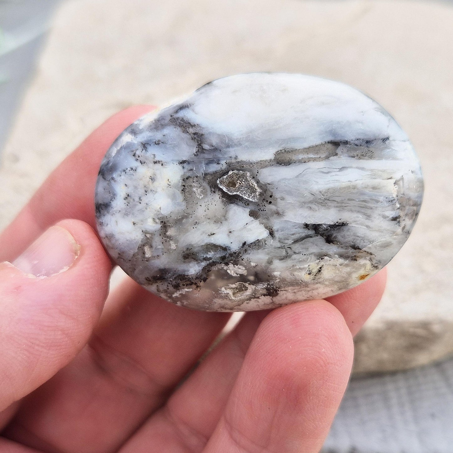 Shop Dendritic Opal Palm Stones for grounding, intuition, and spiritual growth. Handcrafted, polished, and energy-cleansed crystals from Madagascar. 