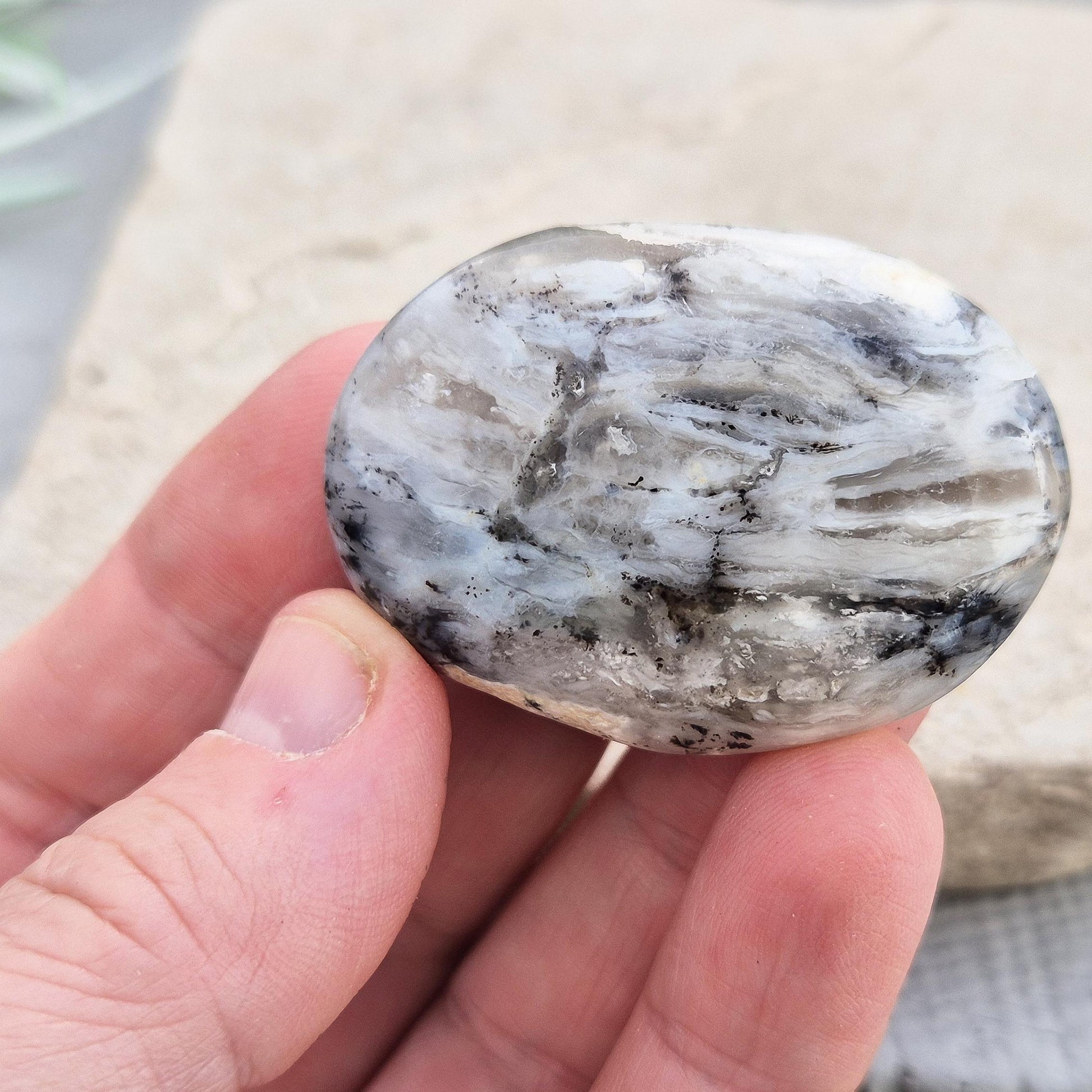 Shop Dendritic Opal Palm Stones for grounding, intuition, and spiritual growth. Handcrafted, polished, and energy-cleansed crystals from Madagascar. 