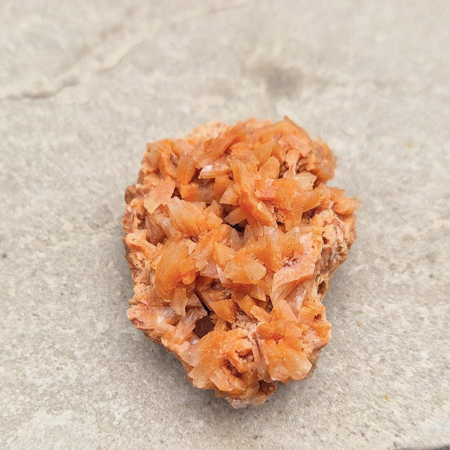 Red Heulandite cluster from India. A high-vibration crystal for emotional healing, spiritual growth, intuition, and balancing energy flow. 