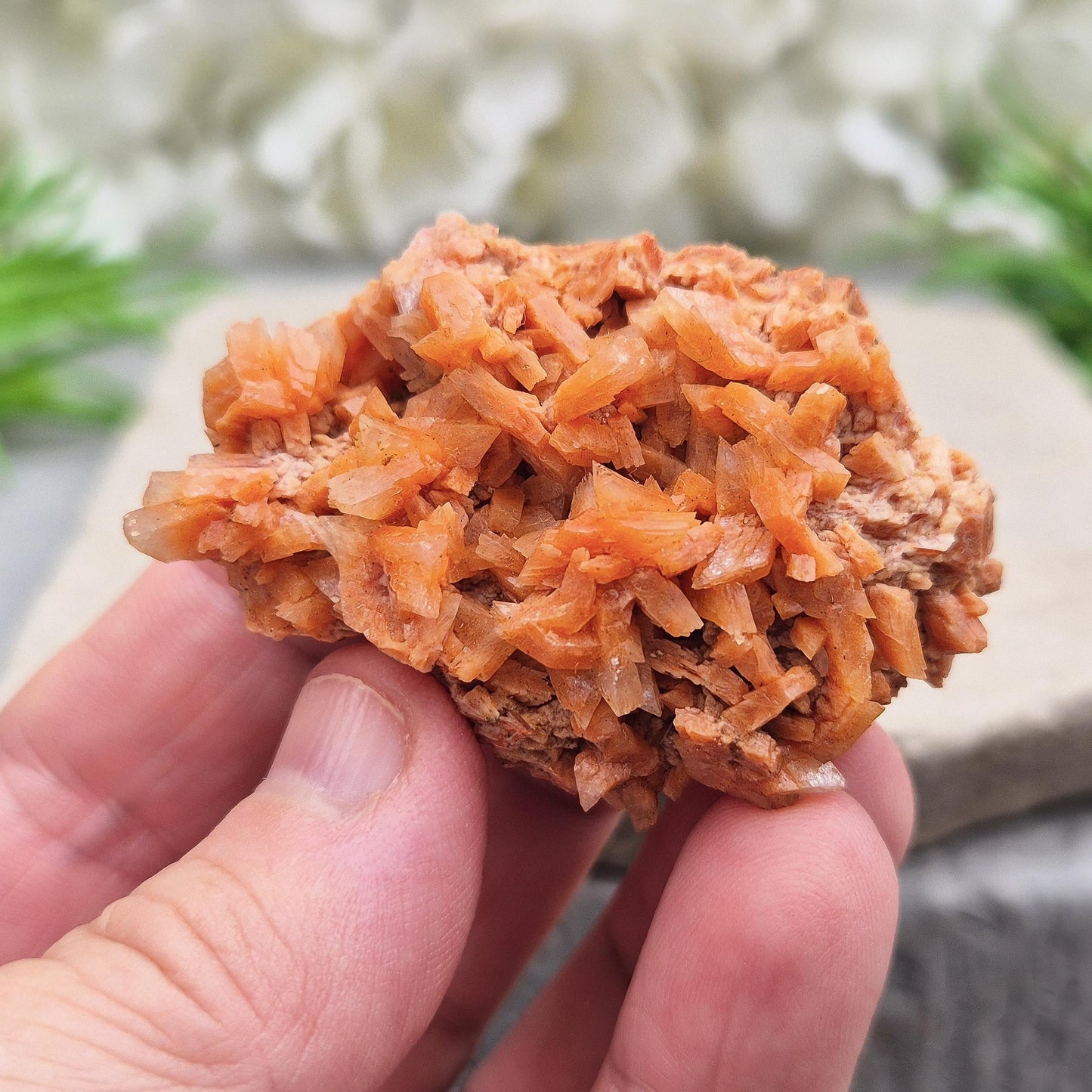 Red Heulandite cluster from India. A high-vibration crystal for emotional healing, spiritual growth, intuition, and balancing energy flow. 