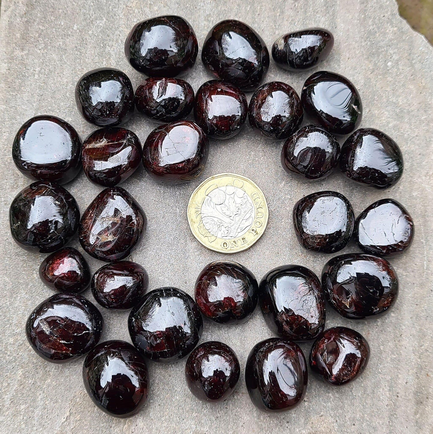 Shop polished Red Garnet crystals from India — deep redbtumbled stones, 8–15gm. Root chakra crystal for courage and motivation, love and passion.