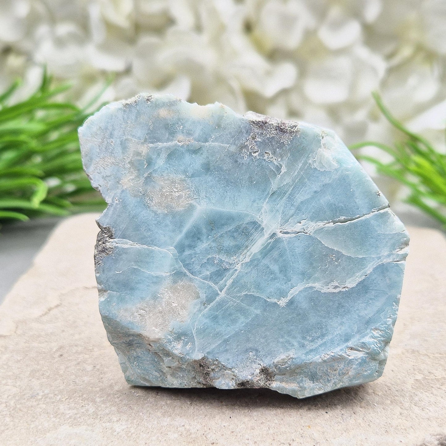 Larimar crystal from the Dominican Republic. Calming energy for peace, feminine flow, and emotional healing. A great addition to your collection.