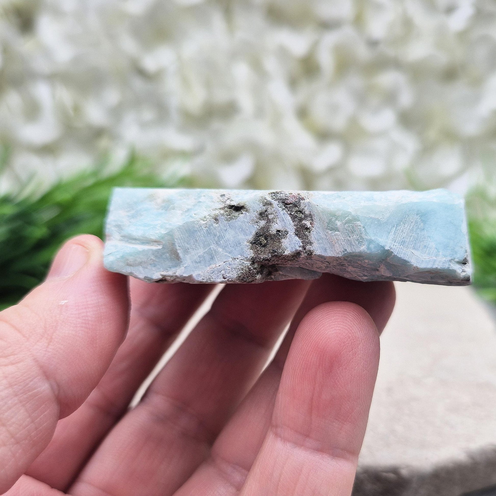 Larimar crystal from the Dominican Republic. Calming energy for peace, feminine flow, and emotional healing. A great addition to your collection.