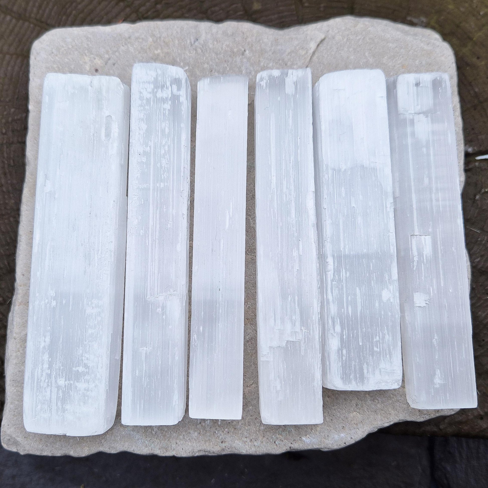 Set of 5 natural Selenite sticks from Morocco – ideal for crystal grids, energy healing, meditation, and space cleansing.