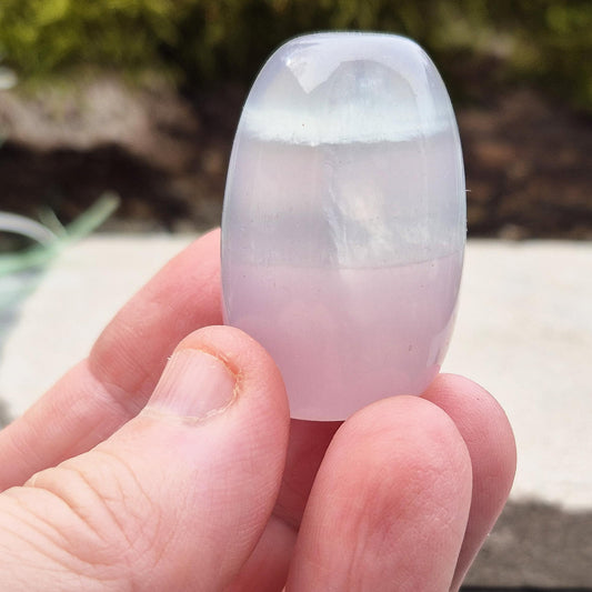 Soothing Lilac Fluorite – A crystal known for promoting calmness, focus, and balance. Ideal for crystal grids, decor, or meditation.