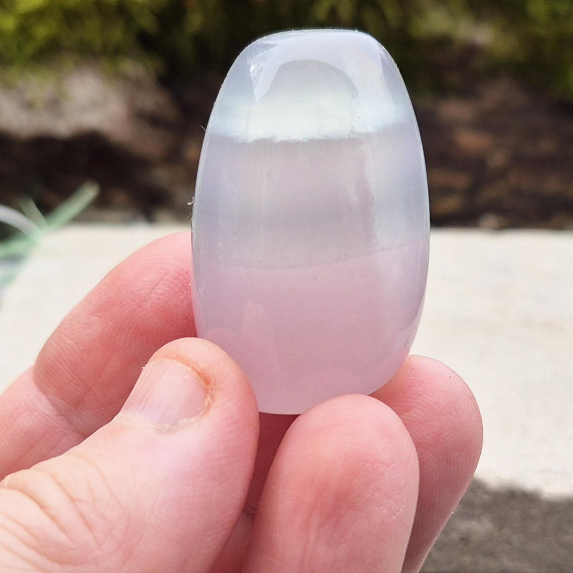 Soothing Lilac Fluorite – A crystal known for promoting calmness, focus, and balance. Ideal for crystal grids, decor, or meditation.