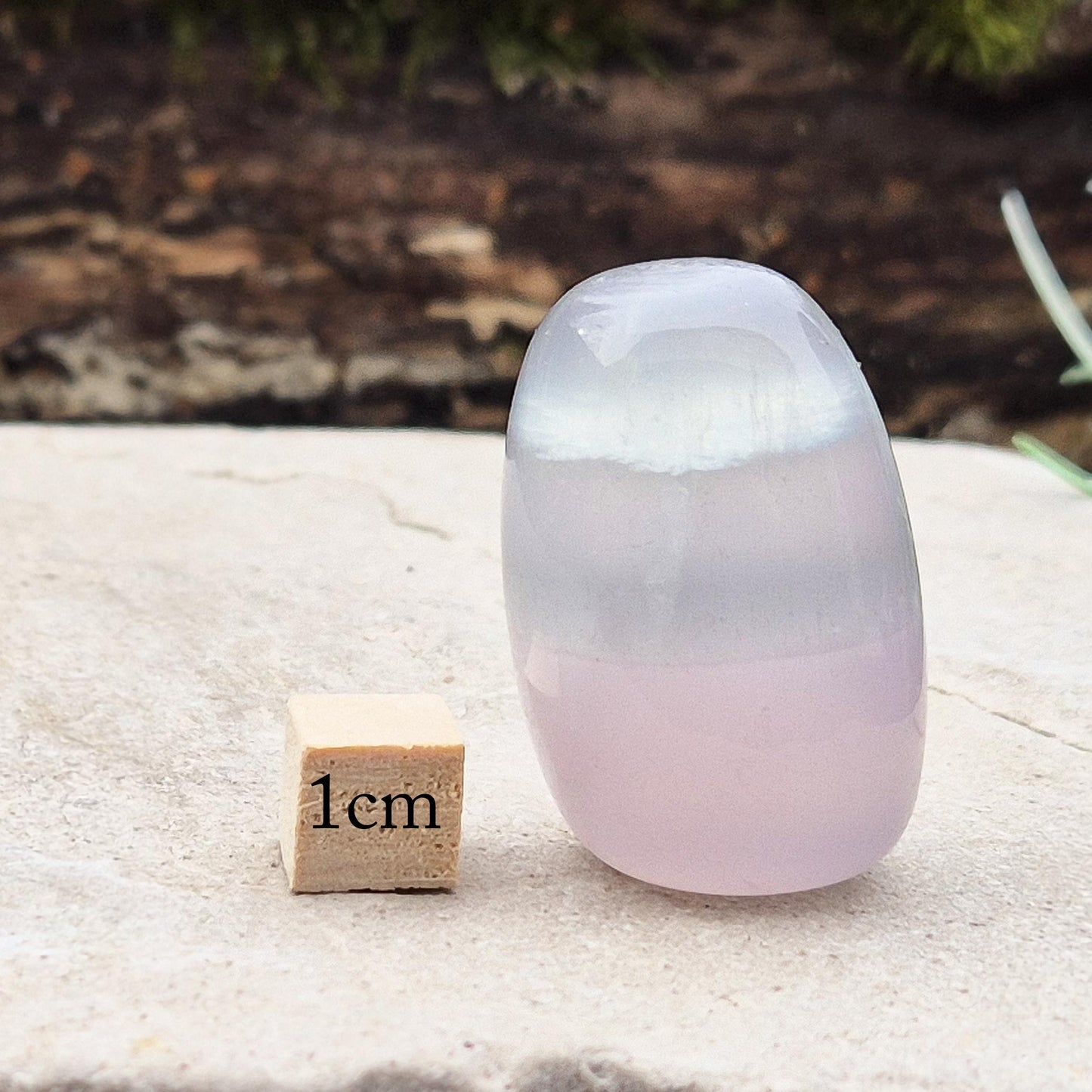 Soothing Lilac Fluorite – A crystal known for promoting calmness, focus, and balance. Ideal for crystal grids, decor, or meditation.