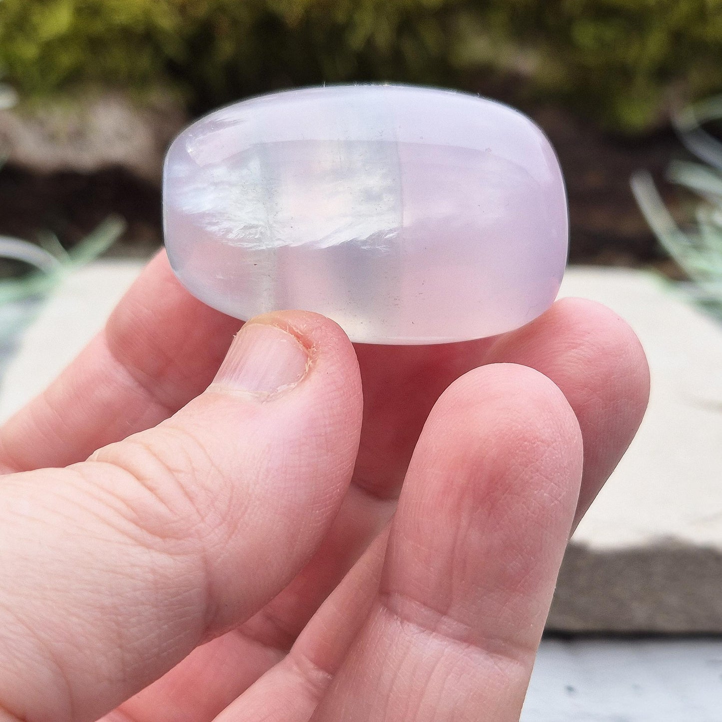 Soothing Lilac Fluorite – A crystal known for promoting calmness, focus, and balance. Ideal for crystal grids, decor, or meditation.