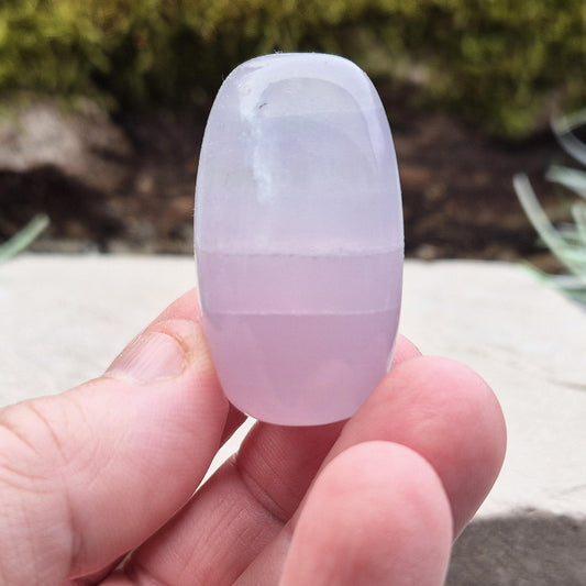 Natural Lilac Fluorite – A rare crystal valued for its calming influence and gentle, harmonizing presence. Perfect for display or meditation.