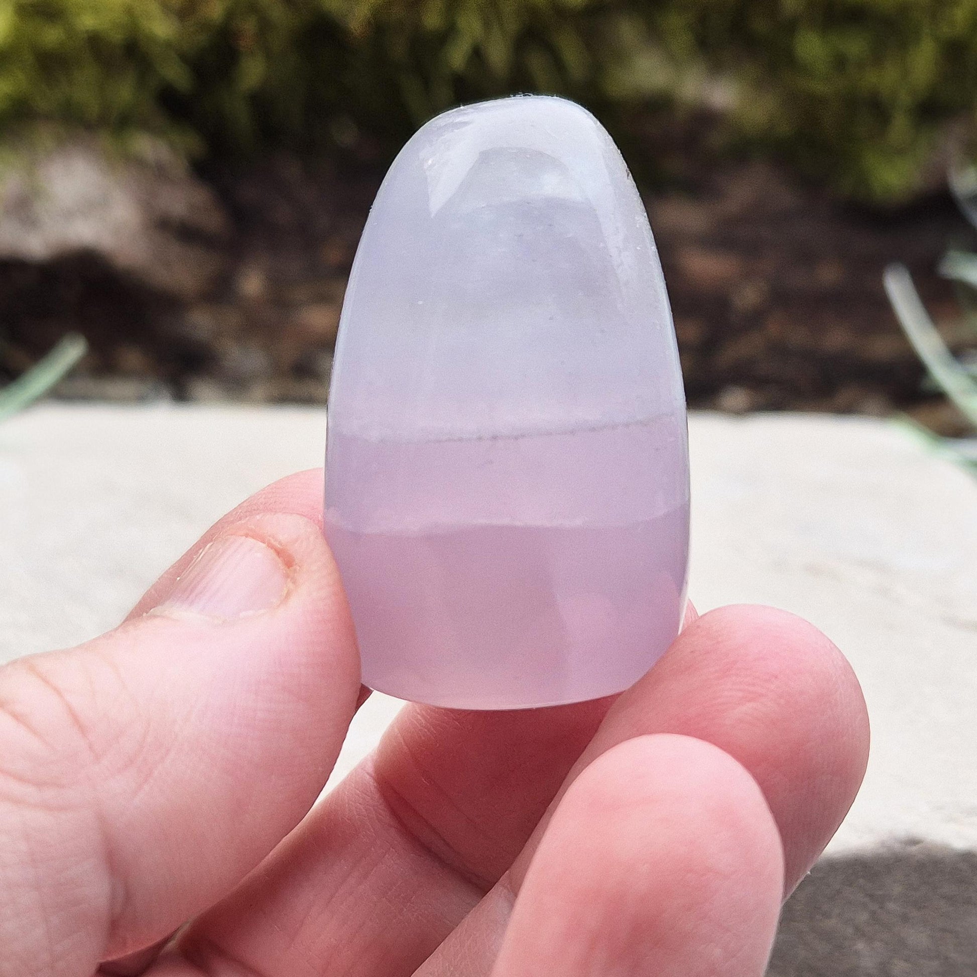 Natural Lilac Fluorite – A rare crystal valued for its calming influence and gentle, harmonizing presence. Perfect for display or meditation.