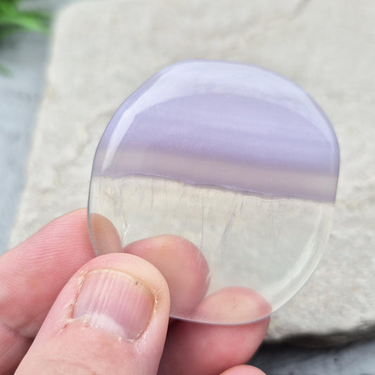 Rare Yttrium Fluorite palm stone for calm, focus, and intuition. Supports clear thinking, spiritual growth, and peaceful energy. Pocket-sized.