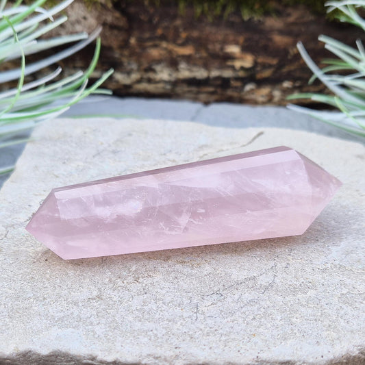 Rose Quartz Vogel Wand – a 12 sided polished vogel cut crystal, perfect for directing energy, promoting balance, and enhancing mindful or spiritual practices.