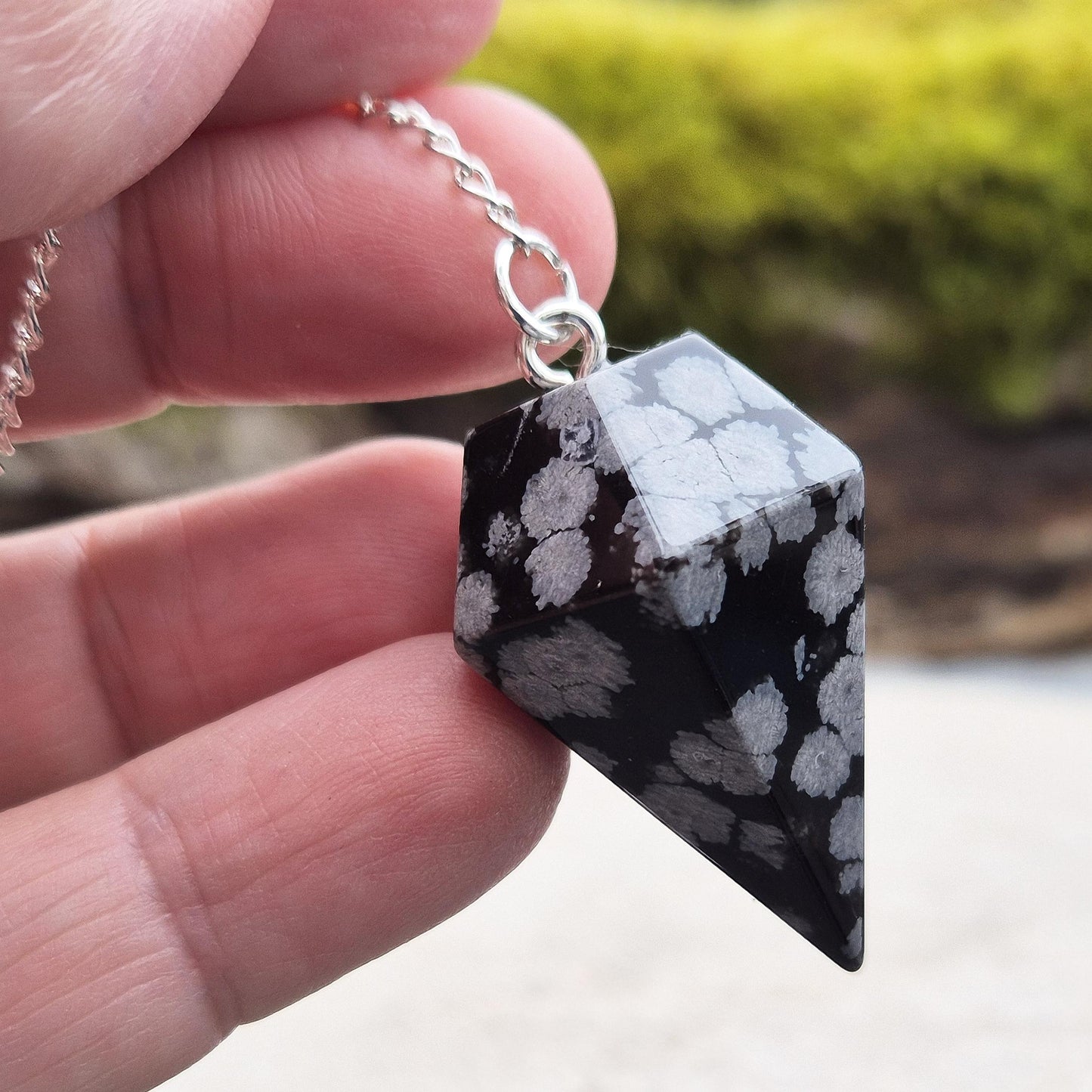 snowflake Obsidian Pendulum – Promotes balance, clears negativity, and supports inner reflection. Ideal for divination and grounding energy work.