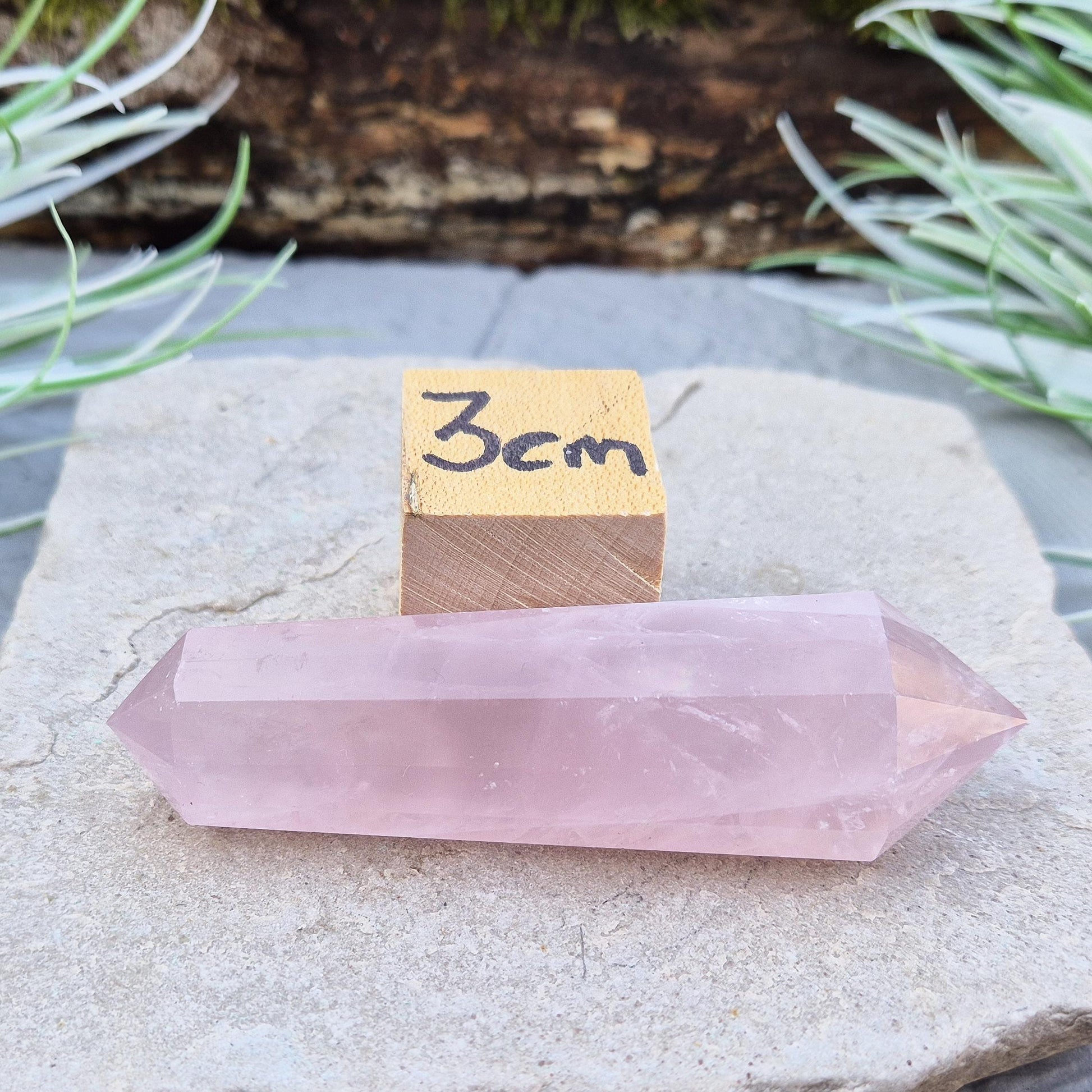 Rose Quartz Vogel Wand – a 12 sided polished vogel cut crystal, perfect for directing energy, promoting balance, and enhancing mindful or spiritual practices.