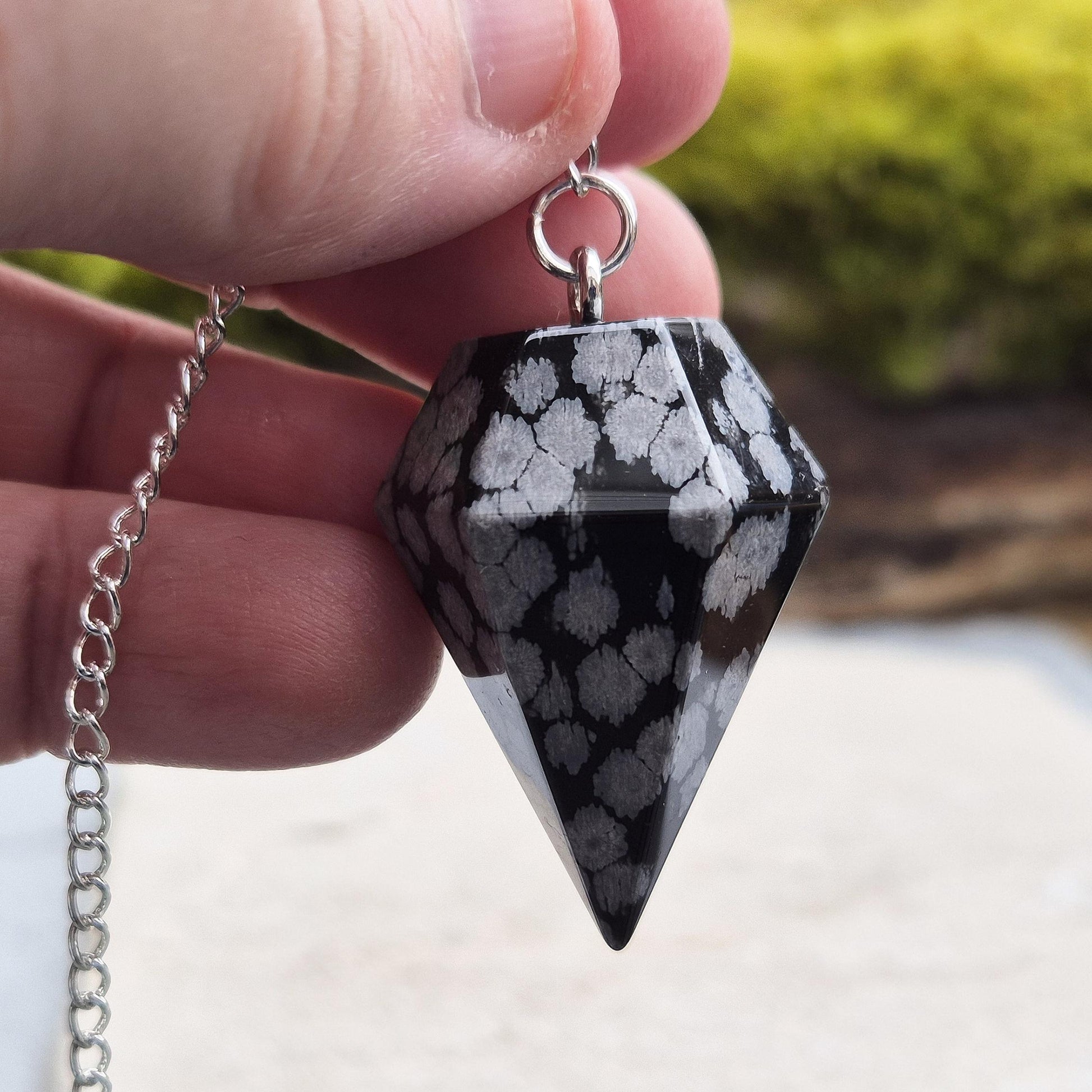 snowflake Obsidian Pendulum – Promotes balance, clears negativity, and supports inner reflection. Ideal for divination and grounding energy work.