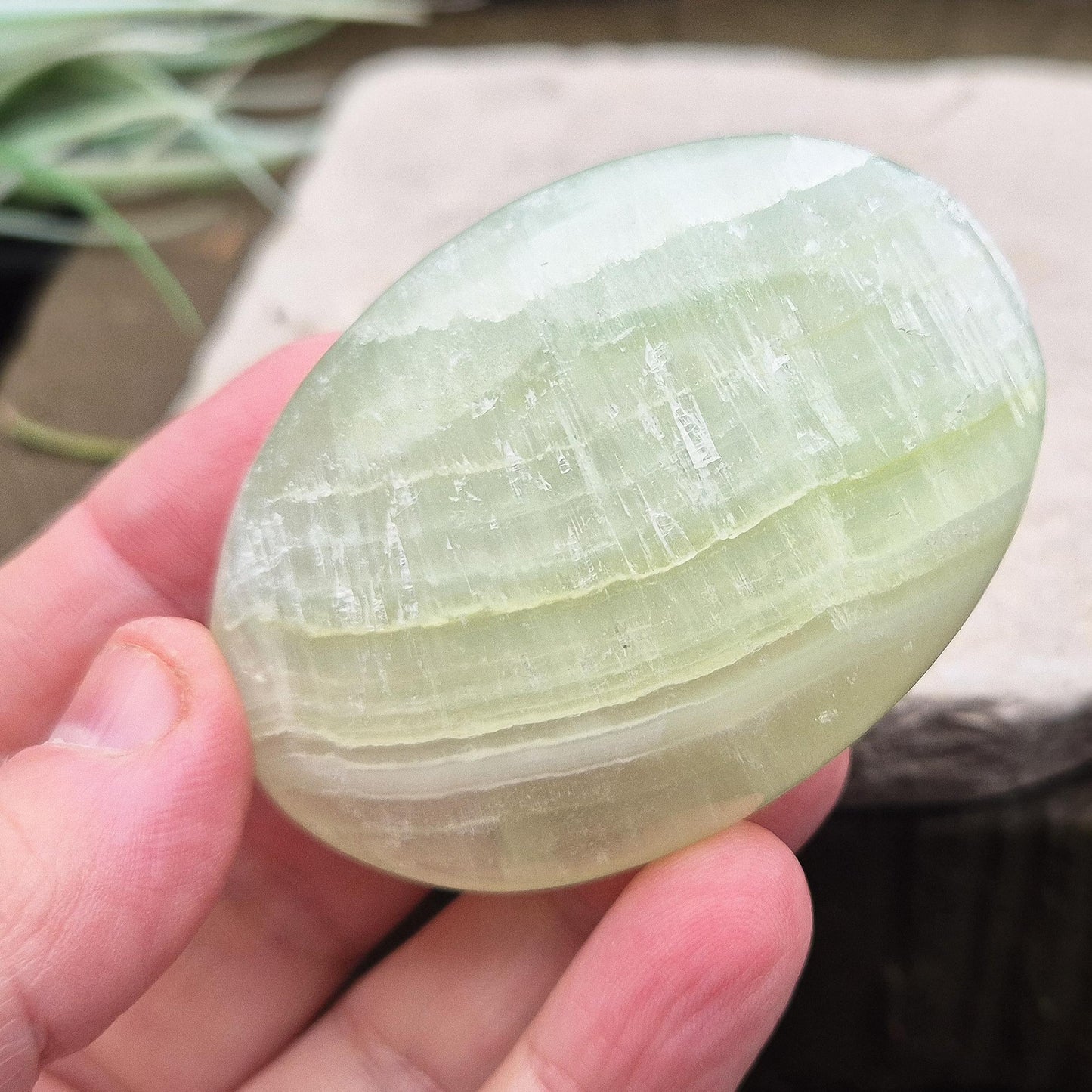 Pistachio Green Calcite palm stone soothes, restores balance, and encourages renewal. Perfect for meditation, emotional healing, and fresh energy flow.