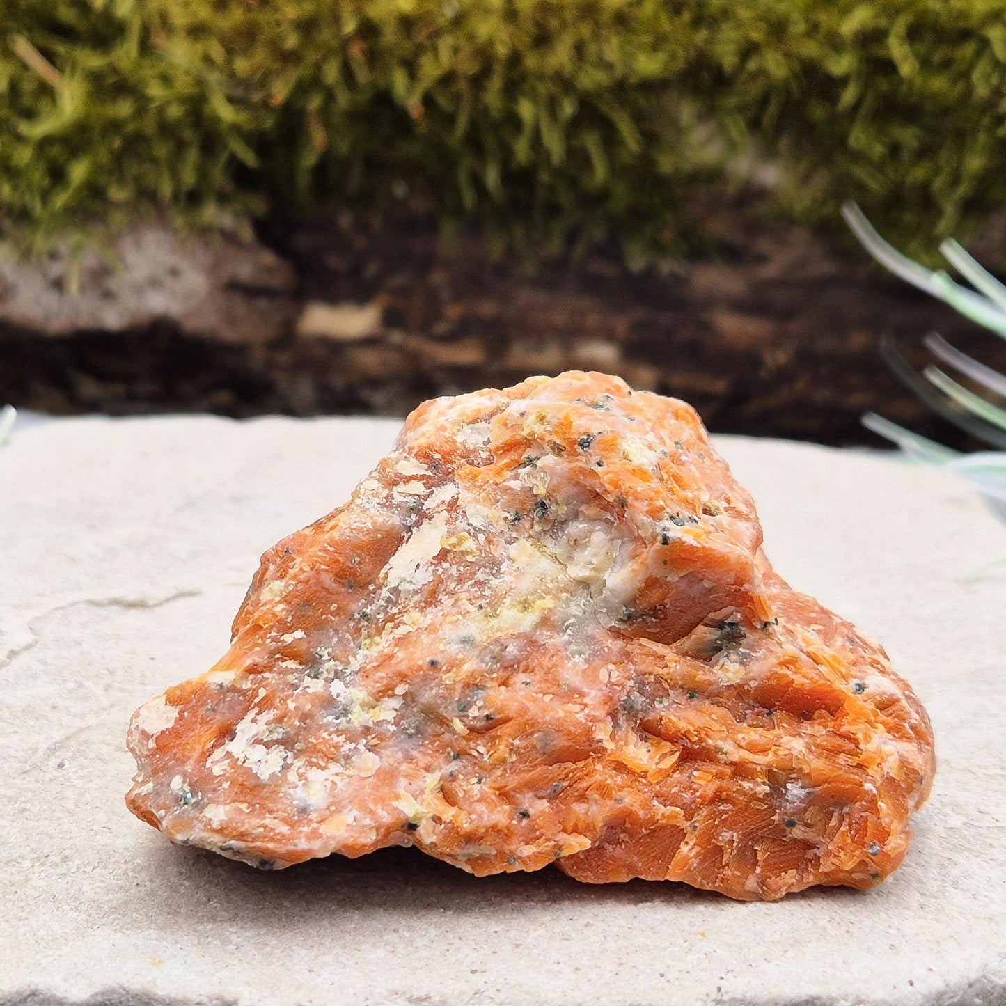Orchid Calcite Crystal – a natural blend of Orange Calcite and Black Tourmaline. Perfect for adding energy and style to your home or workspace.