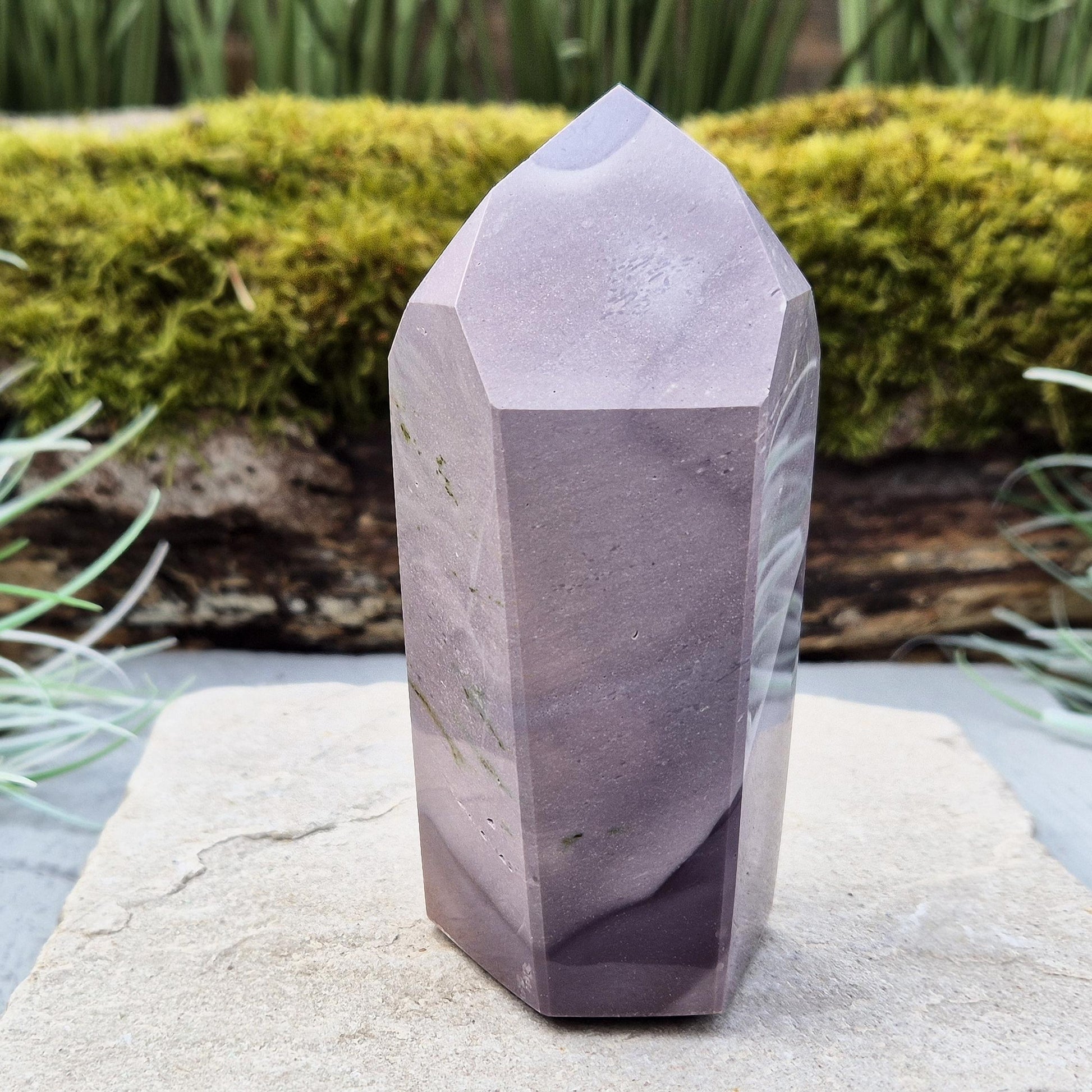 Add a vibrant energy to your home with a mookaite crystal point – a stunning piece that brings vitality, grounding, and natural beauty to any space.