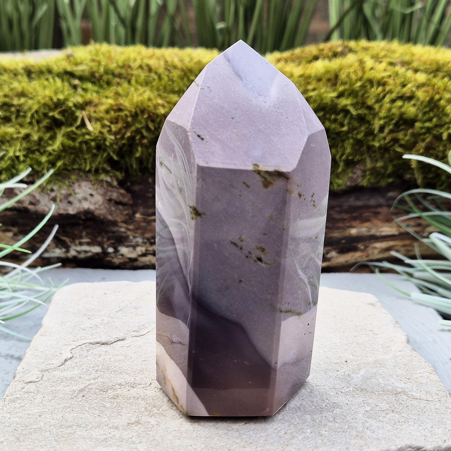 Add a vibrant energy to your home with a mookaite crystal point – a stunning piece that brings vitality, grounding, and natural beauty to any space.