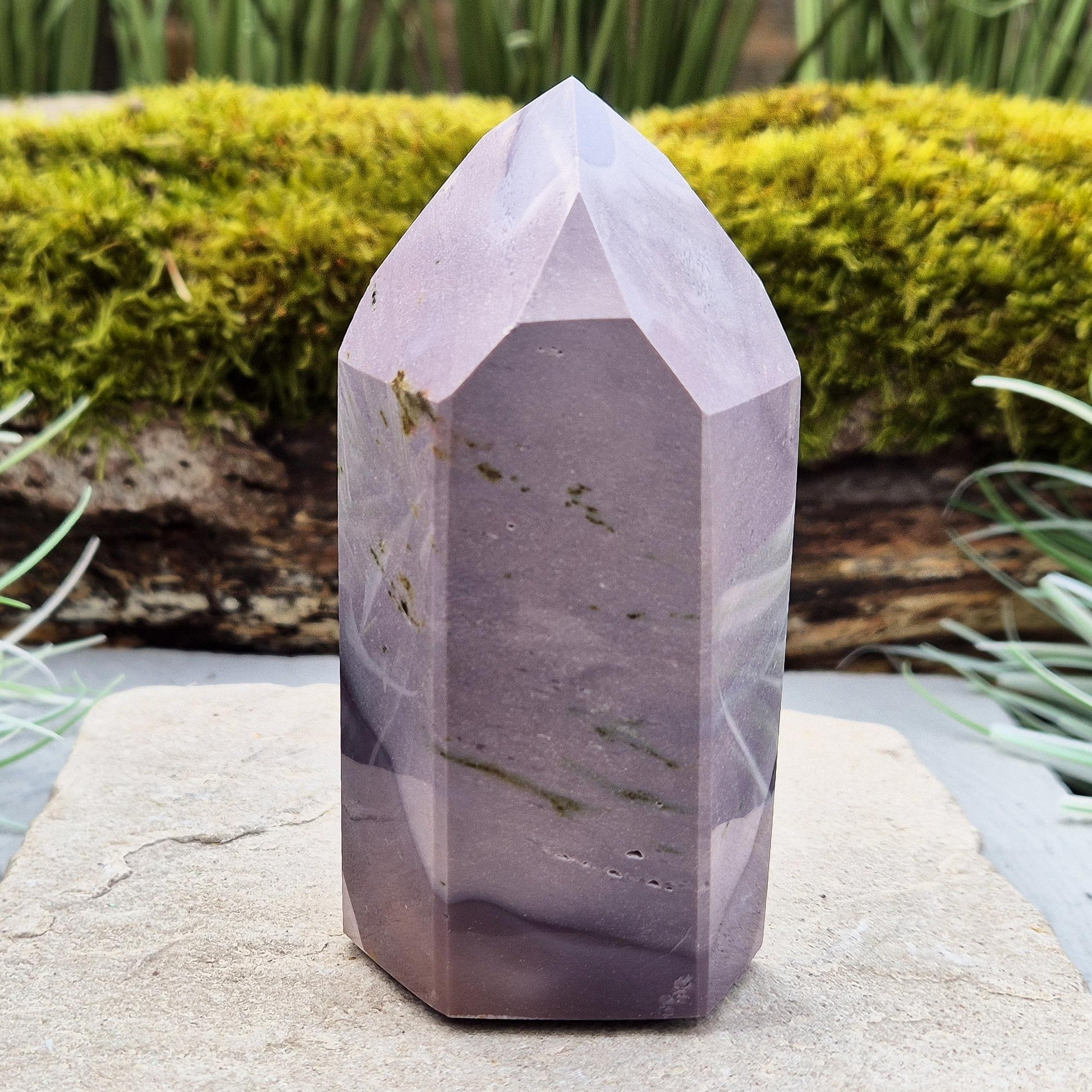 Add a vibrant energy to your home with a mookaite crystal point – a stunning piece that brings vitality, grounding, and natural beauty to any space.
