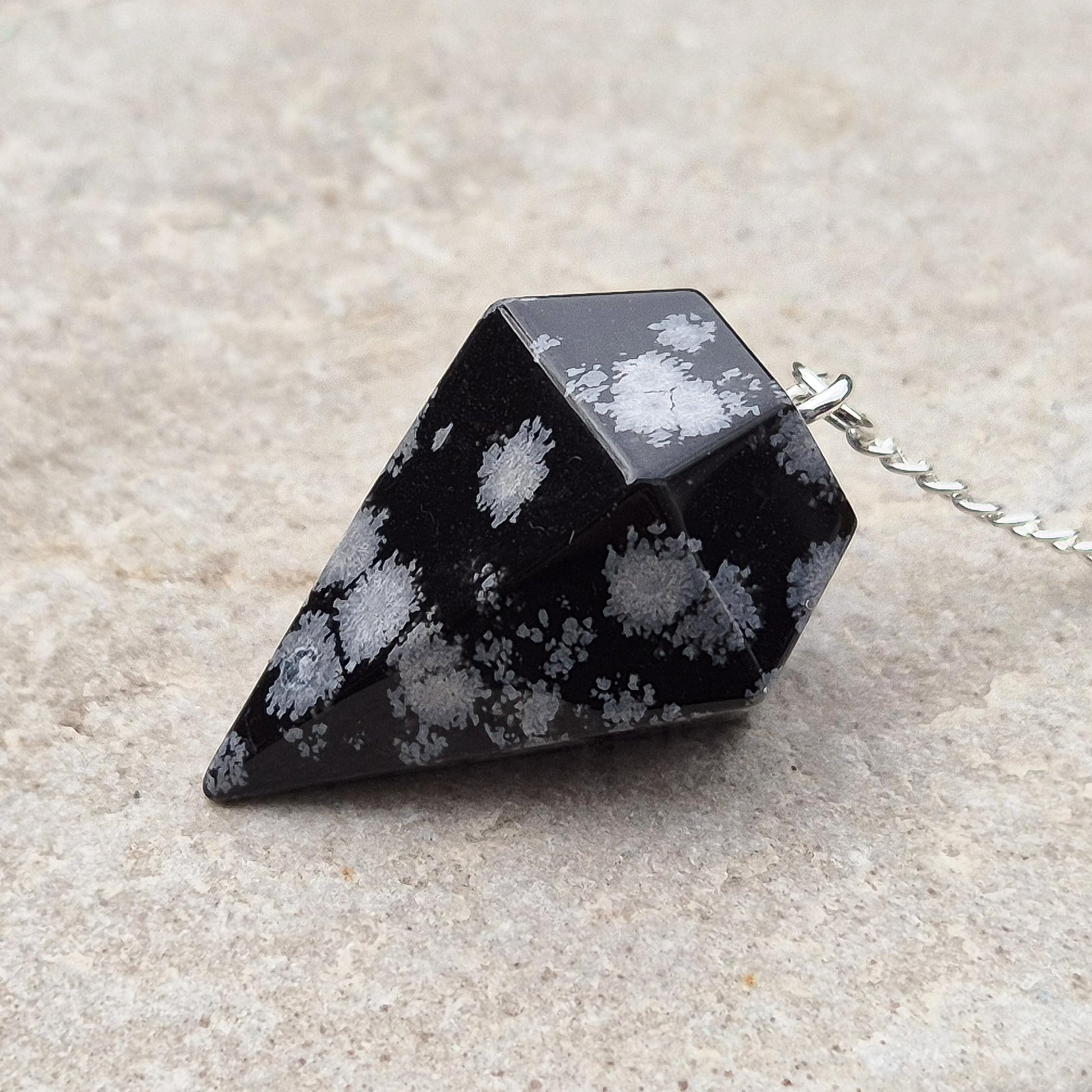 Snowflake Obsidian crystal pendulum – a sleek, elegant tool for focus, clarity, and balanced decision-making. Great tool for divination