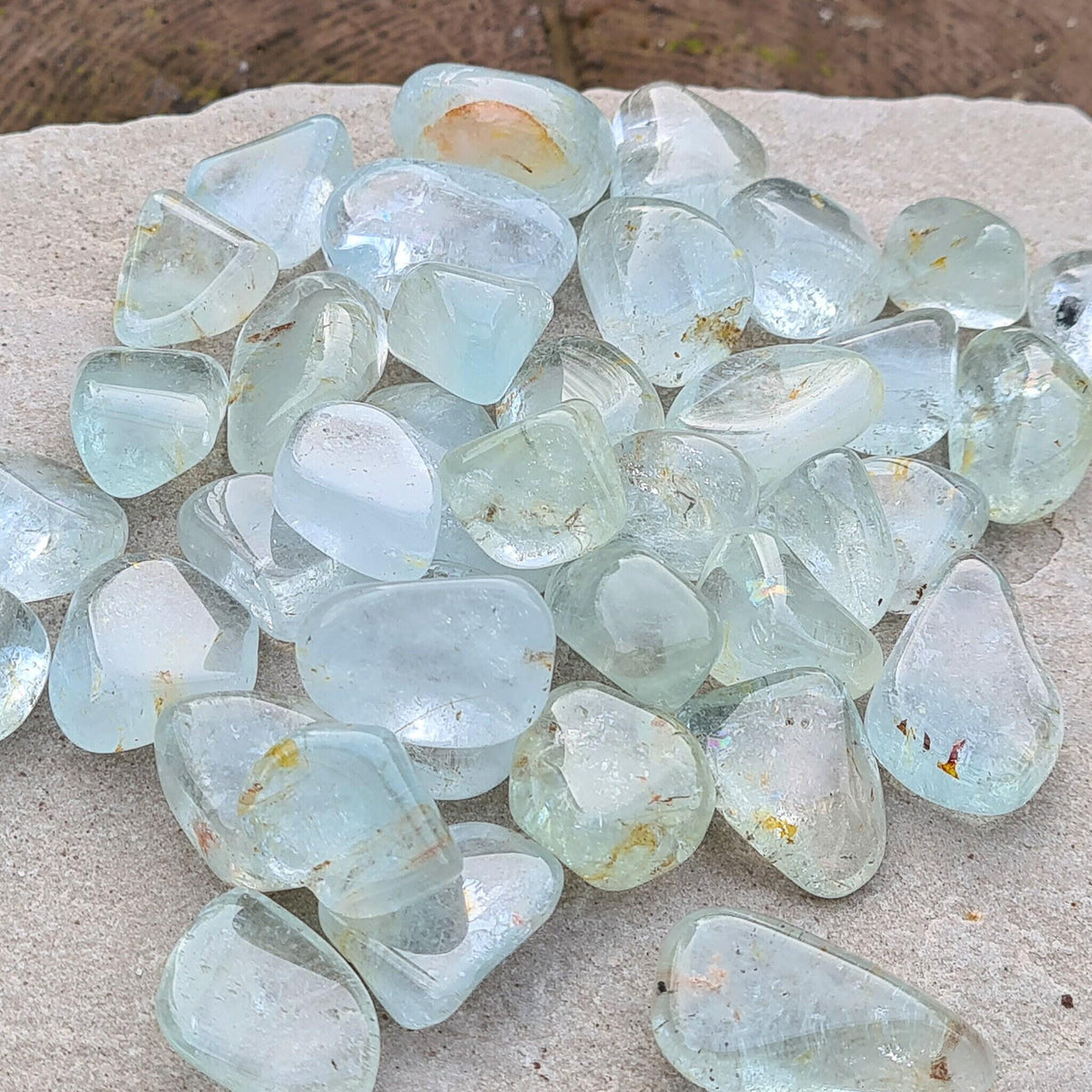 Blue Topaz A grade tumble stones from South Africa. Clear, calming crystal for focus, communication, confidence and mental clarity. Great for study and work.