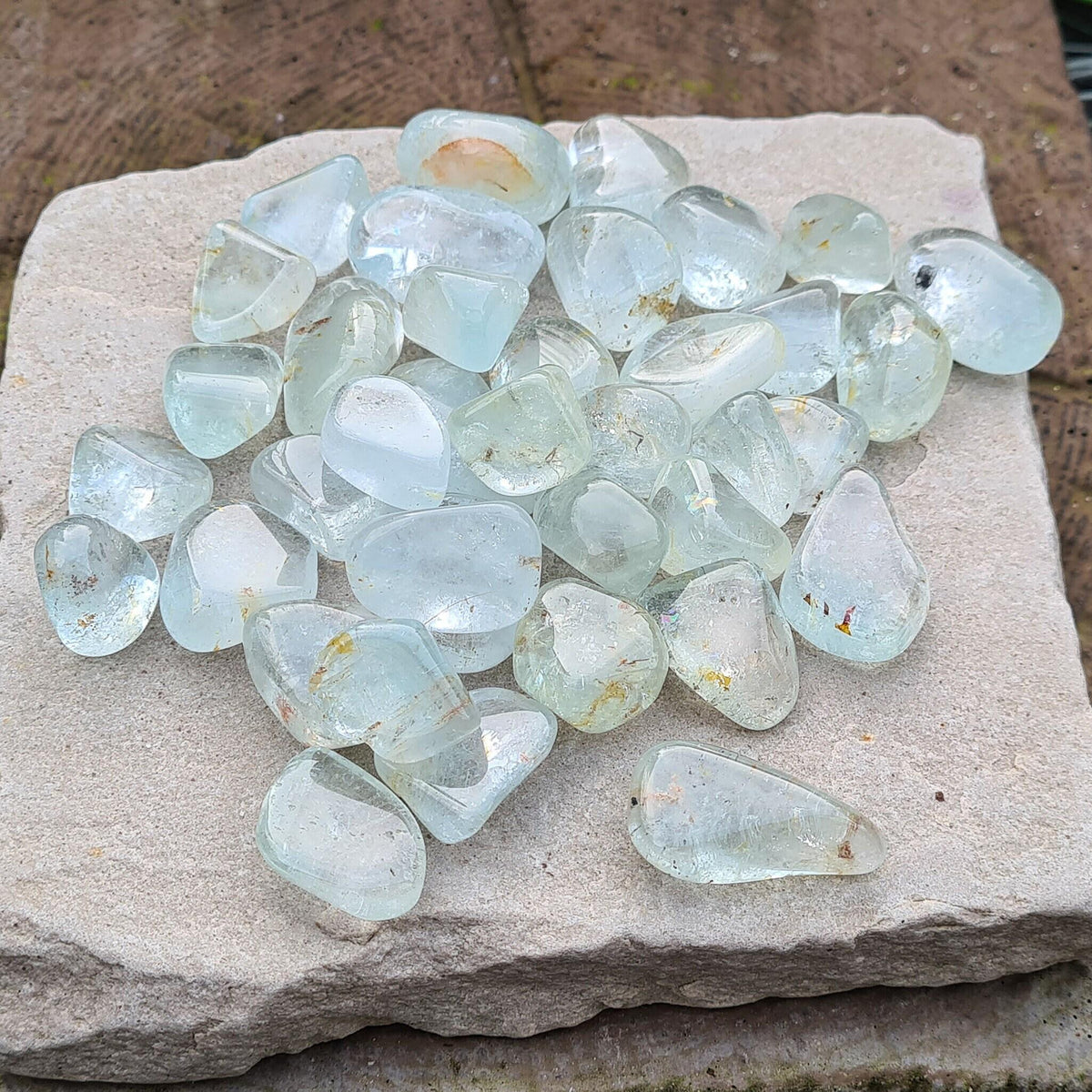 Blue Topaz A grade tumble stones from South Africa. Clear, calming crystal for focus, communication, confidence and mental clarity. Great for study and work.