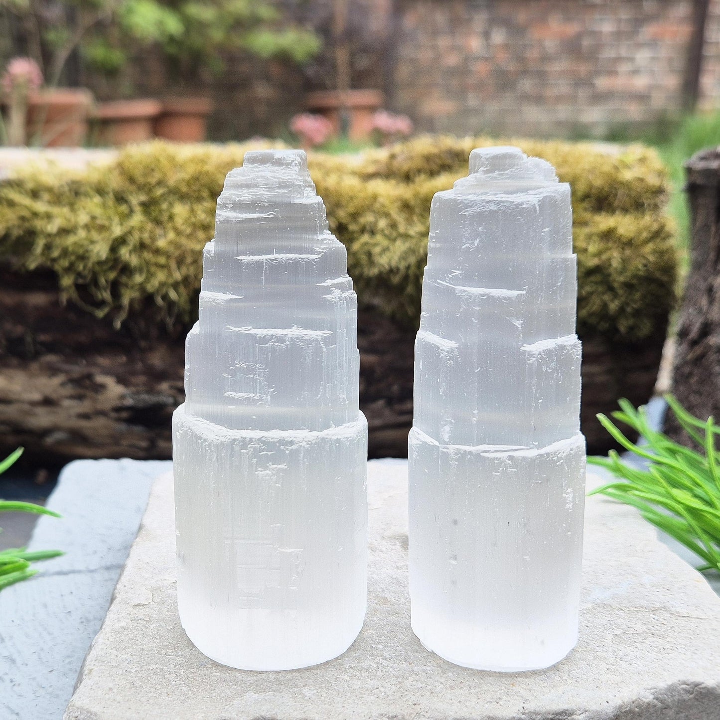 Selenite crystal tower for energy cleansing, clarity, and calm. A striking, high-vibe piece to purify spaces and raise your spiritual frequency.