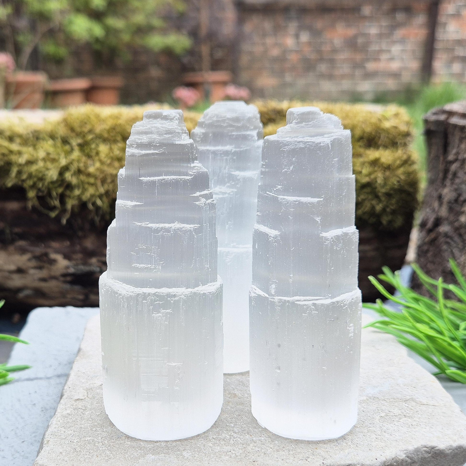 Selenite crystal tower for energy cleansing, clarity, and calm. A striking, high-vibe piece to purify spaces and raise your spiritual frequency.