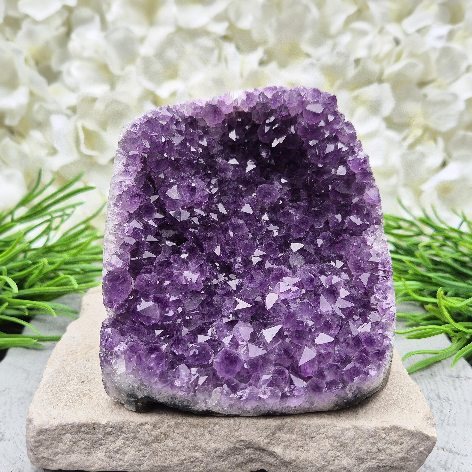 Natural Amethyst geode with deep purple crystals. Ideal for calming spaces, meditation, or display. Cleansed and ready to bring peaceful energy. 