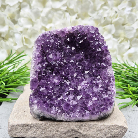 Natural Amethyst geode with deep purple crystals. Ideal for calming spaces, meditation, or display. Cleansed and ready to bring peaceful energy. 