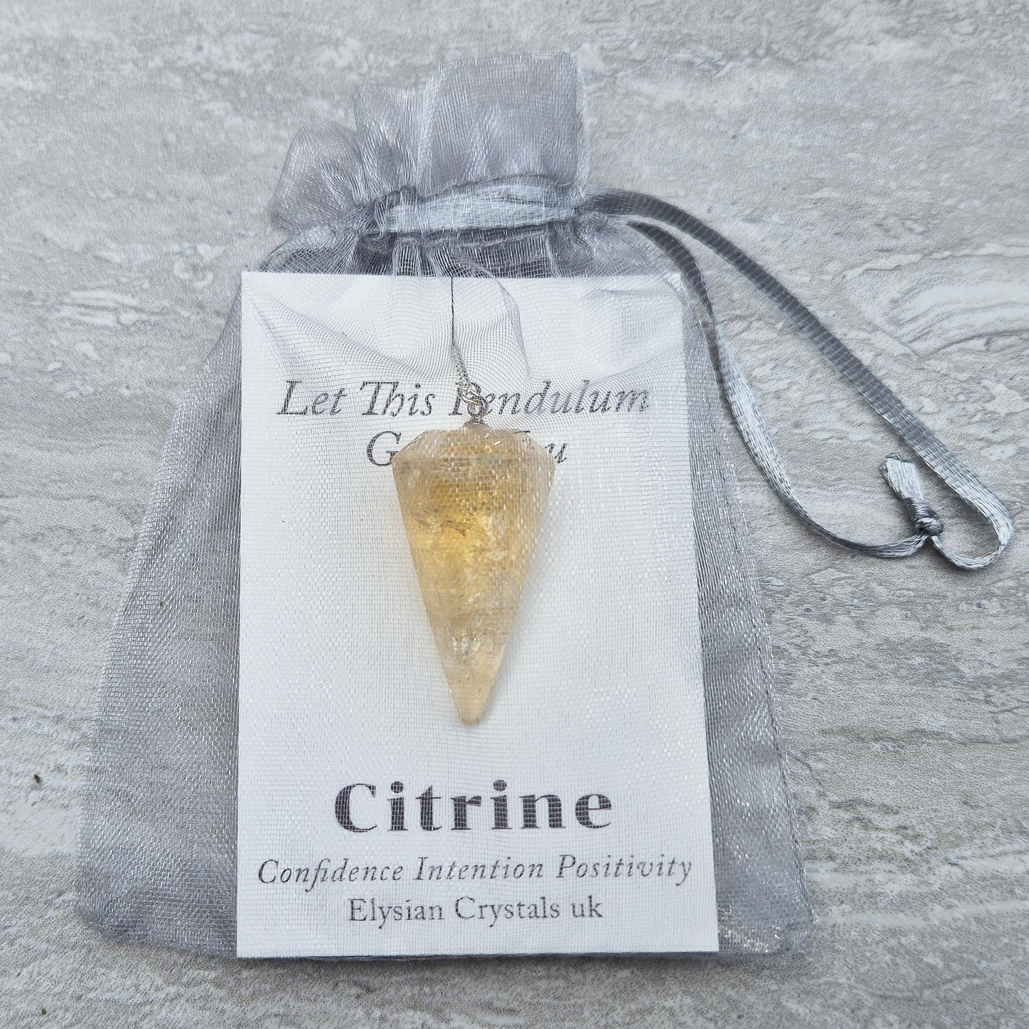 Citrine Crystal Pendulum – an uplifting tool for dowsing, energy work, and spiritual clarity. Ideal for decision-making, chakra work, and meditation. 
