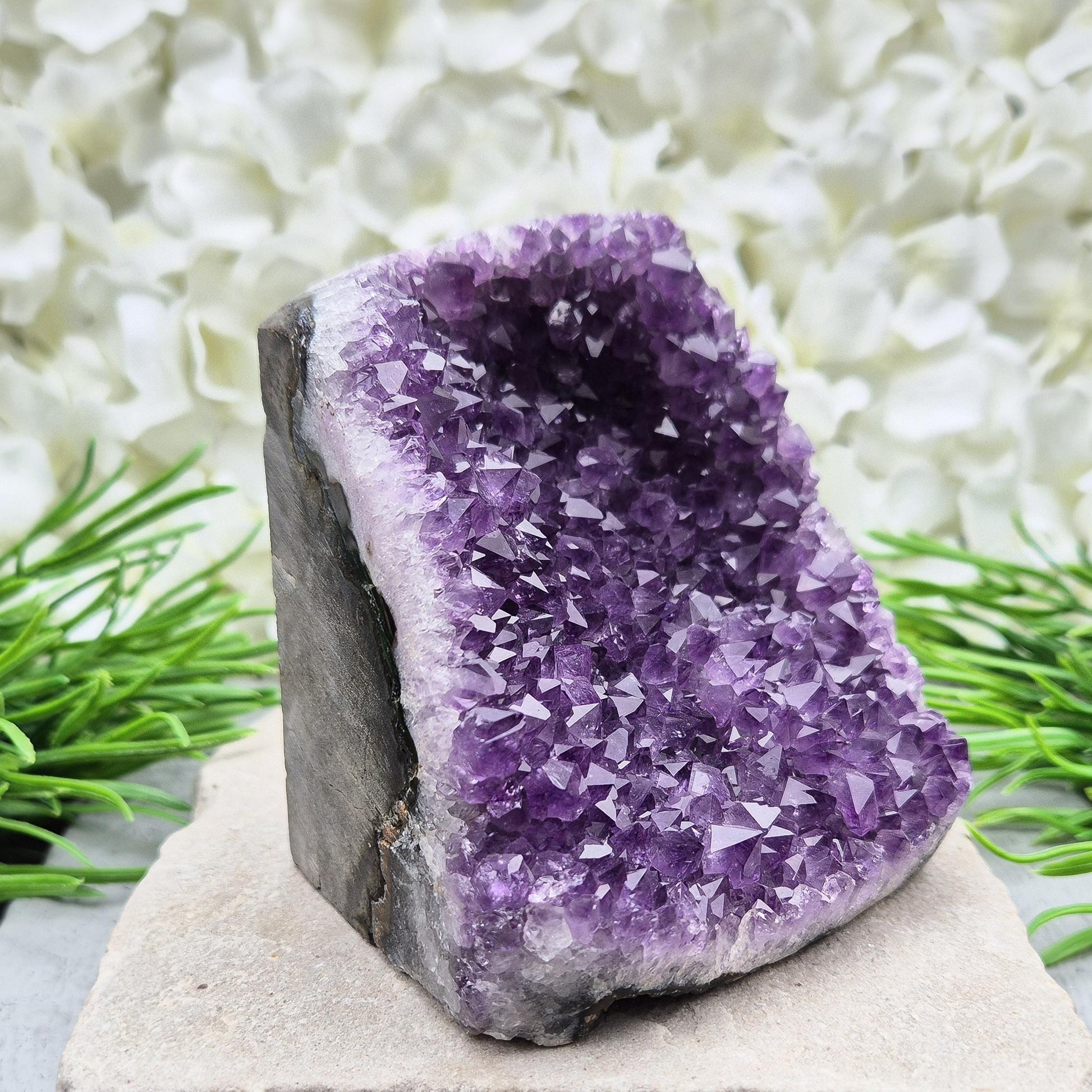 Natural Amethyst geode with deep purple crystals. Ideal for calming spaces, meditation, or display. Cleansed and ready to bring peaceful energy. 