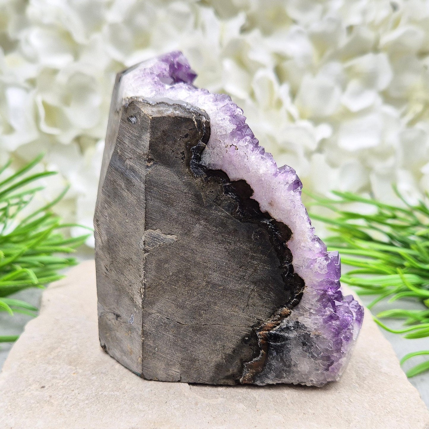 Natural Amethyst geode with deep purple crystals. Ideal for calming spaces, meditation, or display. Cleansed and ready to bring peaceful energy. 