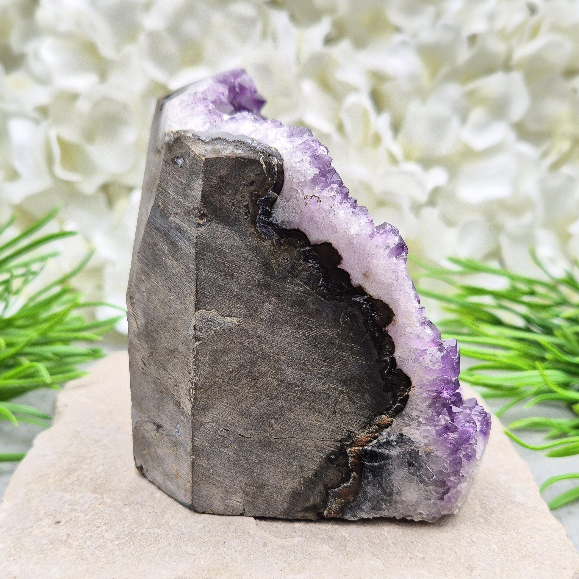 Natural Amethyst geode with deep purple crystals. Ideal for calming spaces, meditation, or display. Cleansed and ready to bring peaceful energy. 