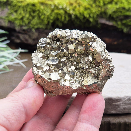 Shop our stunning cubic Pyrite cluster, known for its grounding energy and creative inspiration. Perfect for collectors and crystal enthusiasts.