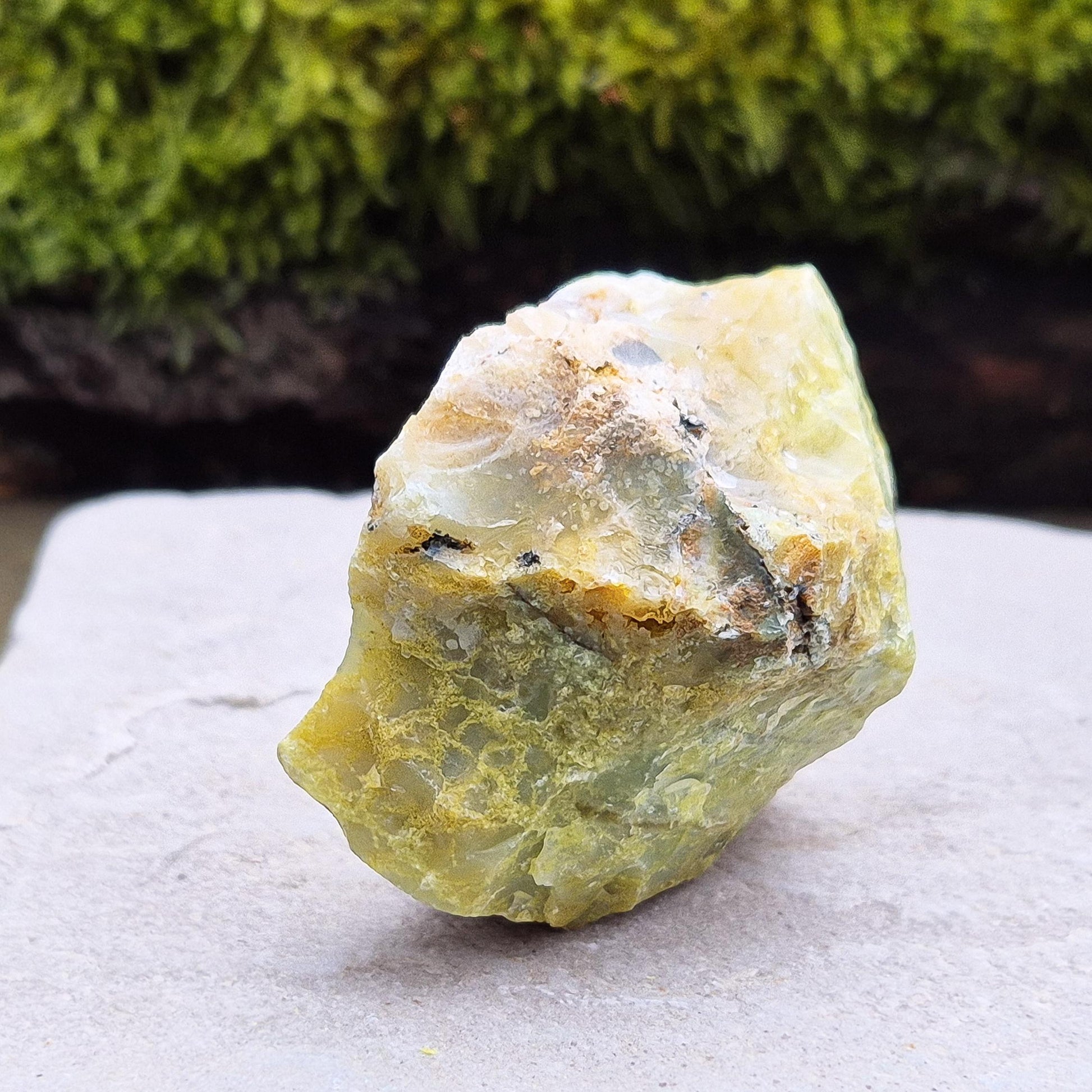 Green Opal: Vibrant and soothing, this natural crystal promotes emotional healing, intuition, and harmony. 