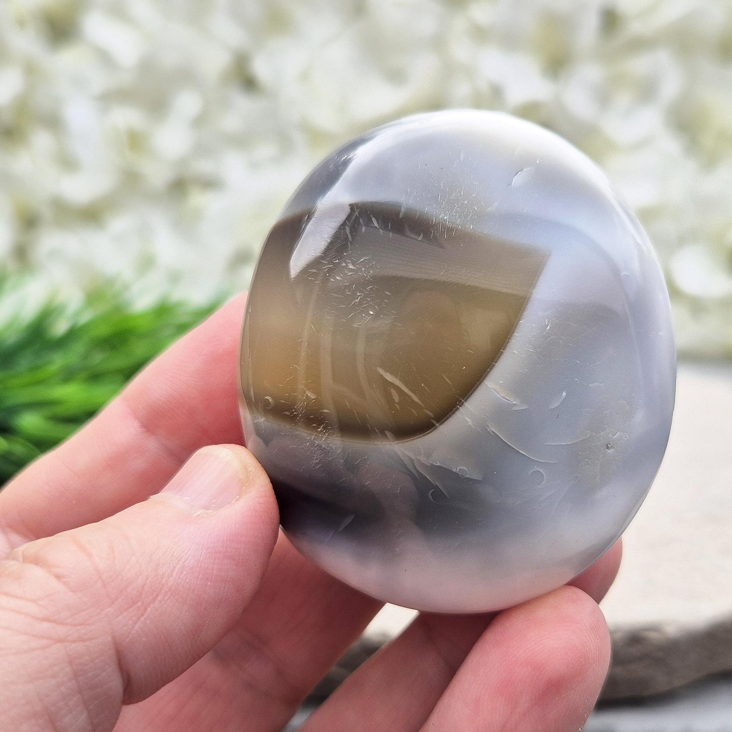 Orca Agate pebble from Madagascar. A rare crystal for emotional healing, forgiveness, inner strength, and support through life’s challenges.