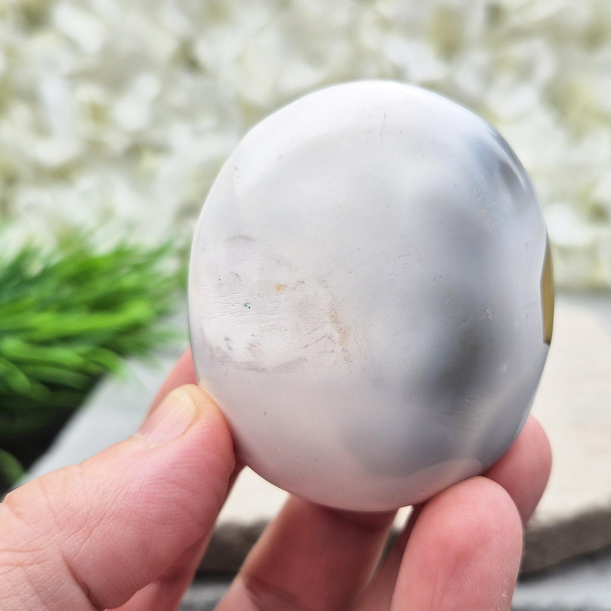 Orca Agate pebble from Madagascar. A rare crystal for emotional healing, forgiveness, inner strength, and support through life’s challenges.